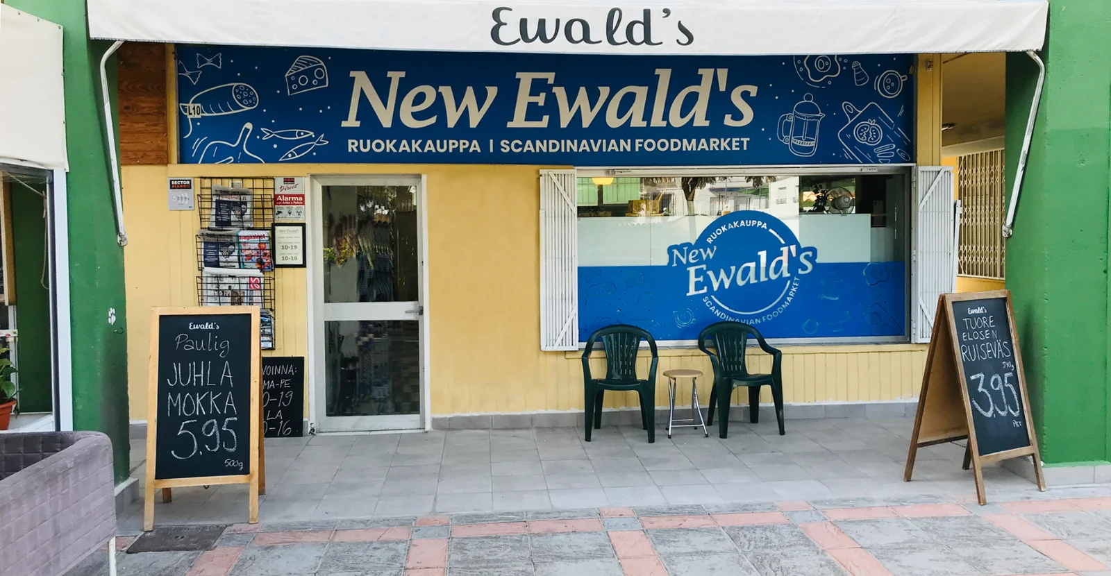The New Ewald's storefront in Fuengirola, with the Finnish chalkboards out front